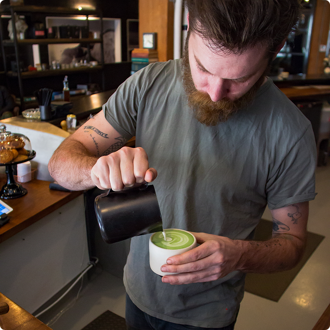 Pouring a cup of matcha at home